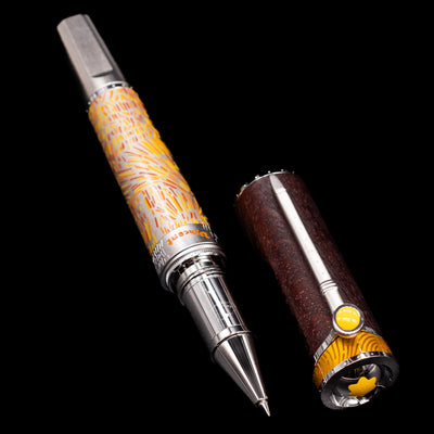  A full view of the Montblanc Masters of Art Homage to Vincent Van Gogh Limited Edition 4810 Rollerball Pen - Preowned uncapped, with its cap laying next to the pen.