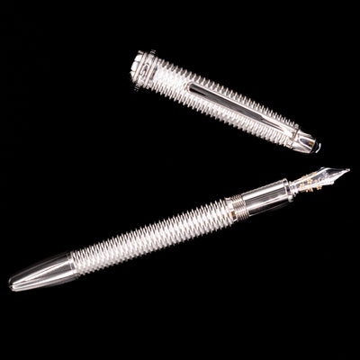 AN overhead view of the Montblanc Meisterstuck 146 Solitaire Geometry City Edition LeGrand Fountain Pen - Tokyo uncapped.
