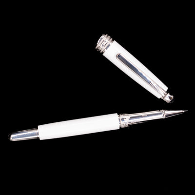 Overhead view of the preowned Montblanc Meisterstück 163 Solitaire Tribute to Mont Blanc rollerball pen, showcasing the streamlined silhouette, white lacquer barrel, and platinum clip.