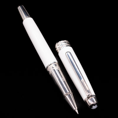 Preowned Montblanc Meisterstück 163 Solitaire Tribute to Mont Blanc rollerball pen displayed uncapped, highlighting the platinum grip, white lacquer barrel, and intricate grip detailing.