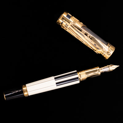 An overhead view of the Montblanc Patron of Art Henry Steinway 888 Fountain Pen uncapped.