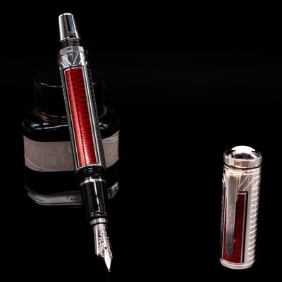 Montblanc Patron of Art Sir Henry Tate 4810 Fountain Pen - Preowned leaning on an ink bottle uncapped showcasing the detailing on the nib.