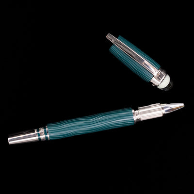 An overhead view of the Montblanc Starwalker Resin Rollerball Fineliner Pen - Polar Green uncapped. 