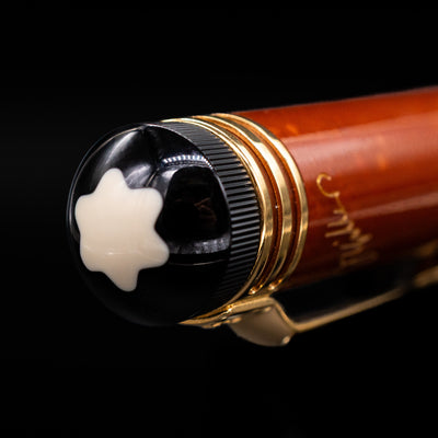 Zoomed-in view of the top of the cap with the finial on the Montblanc Writer's Edition 2000 Friedrich Schiller Fountain Pen - Preowned.