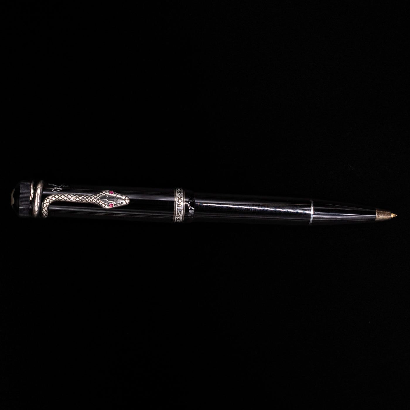 An overhead view of the Montblanc Writer's Edition Agatha Christie Ballpoint Pen - Preowned activated.