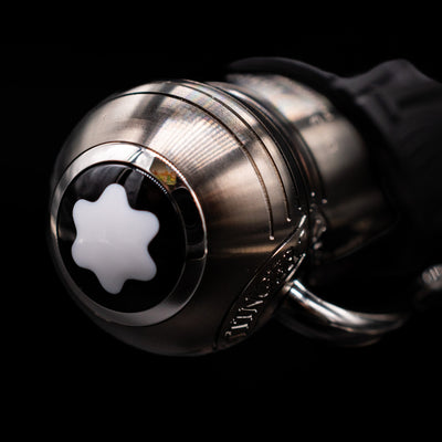 Zoomed-in view of the top of the cap with the finial on the Montblanc Writer's Edition Brothers Grimm Ballpoint Pen - Preowned.