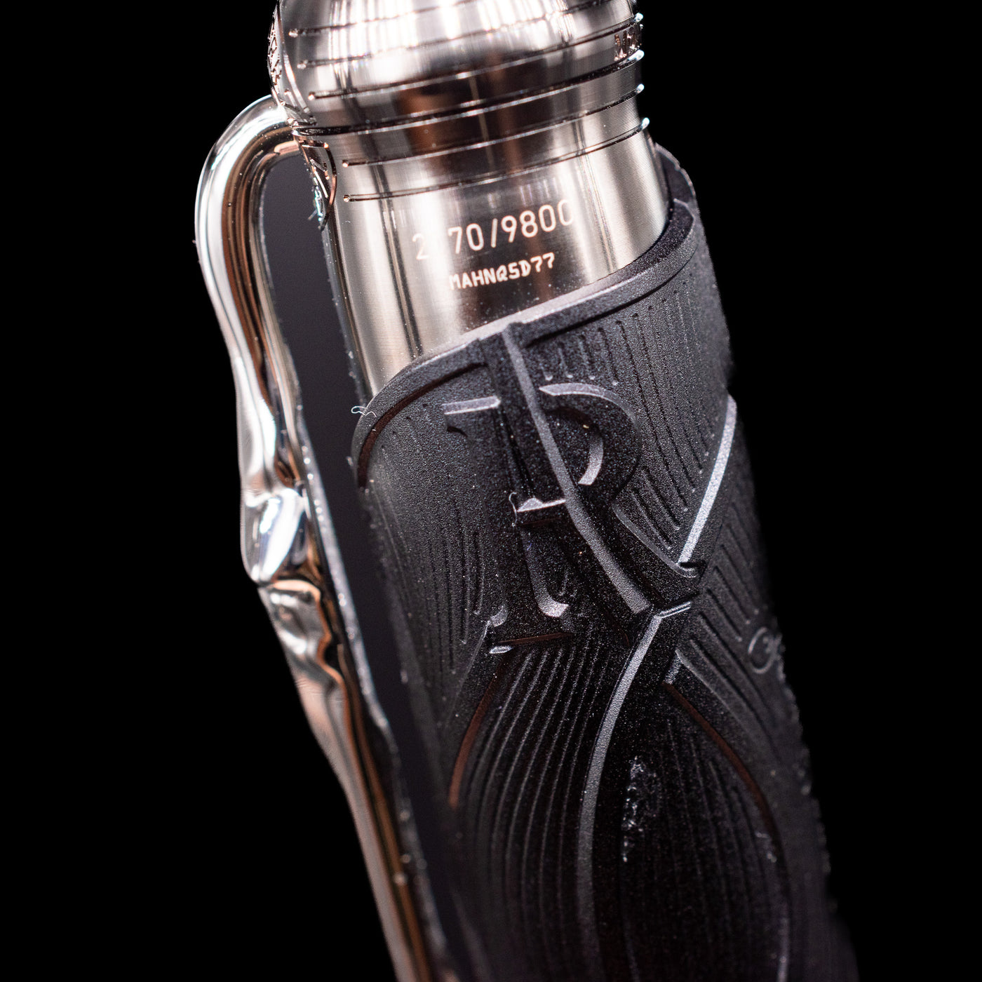 A zoomed-in view of the side of the cap on the Montblanc Writer's Edition Brothers Grimm Fountain Pen.