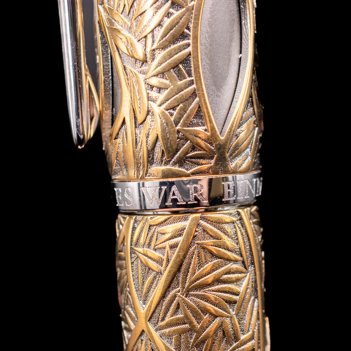 A close-up shot of the detailing along the Montblanc Writer's Edition Brothers Grimm Limited Edition 1812 Rollerball Pen - Preowned.