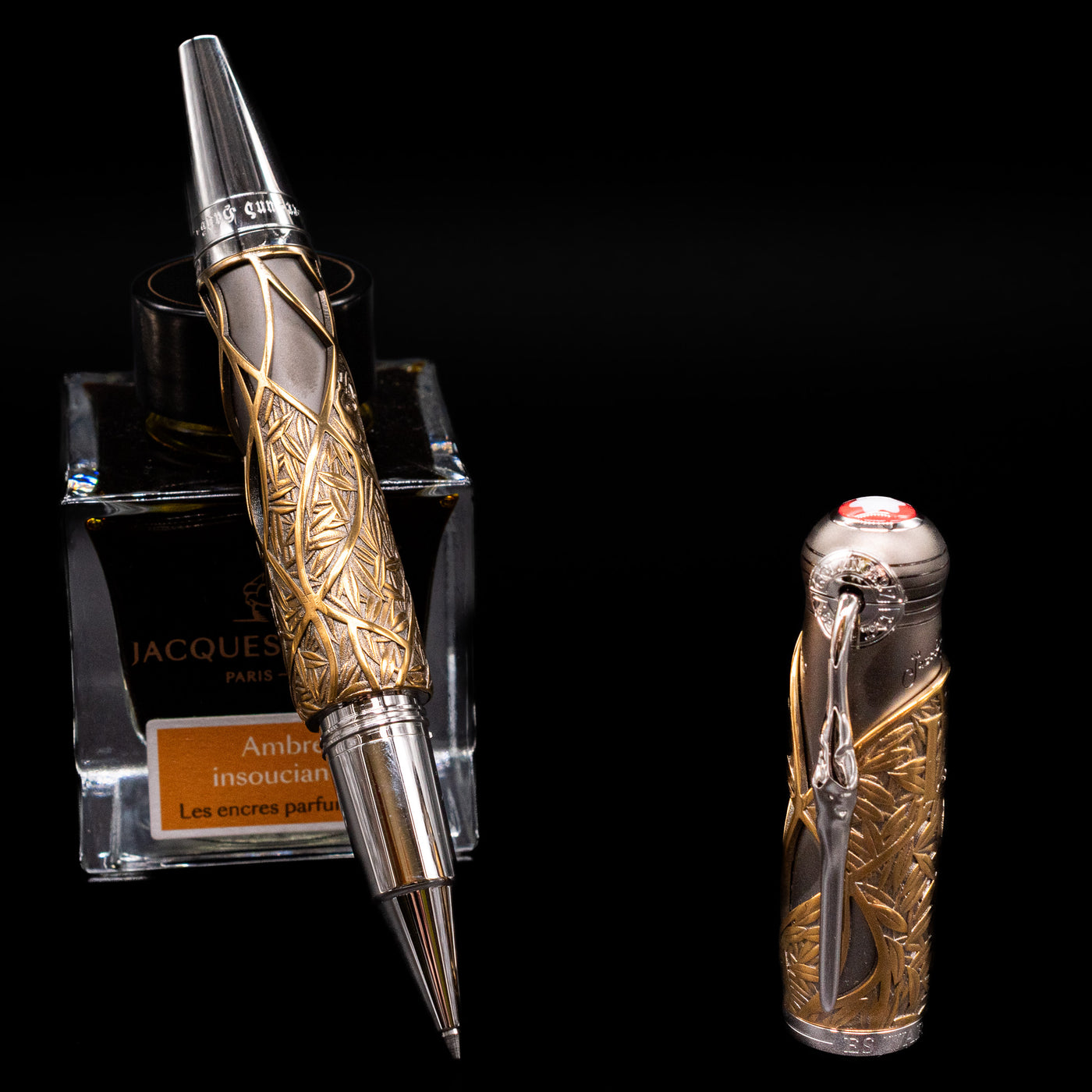  Montblanc Writer's Edition Brothers Grimm Limited Edition 1812 Rollerball Pen - Preowned leaning on an ink bottle uncapped.