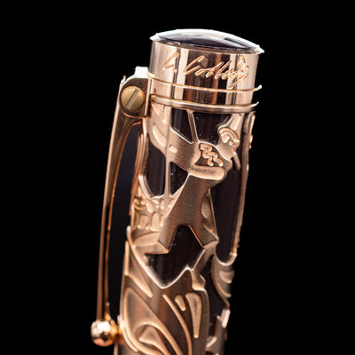 A detail shot of the character of pinnochio on top of the Montblanc Writer's Edition Carlo Collodi Ballpoint Pen - Preowned.