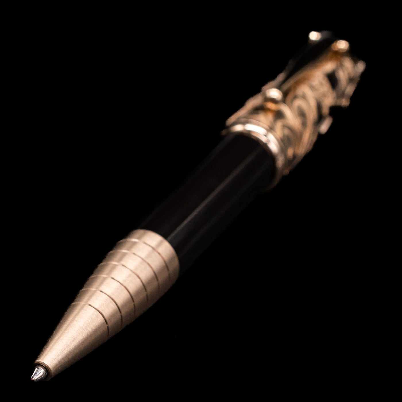 A full view of the Montblanc Writer's Edition Carlo Collodi Ballpoint Pen - Preowned with a focus on the tip.