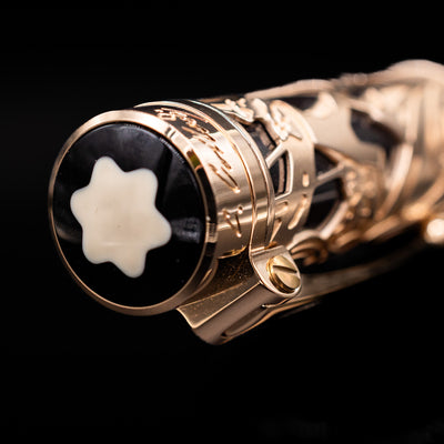 A zoomed-in view of the top of the cap with the finial for the Montblanc Writer's Edition Carlo Collodi Ballpoint Pen - Preowned.