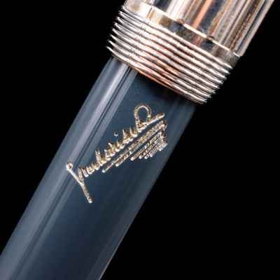 A macro shot of the signature on the barrel of the Montblanc Writer's Edition Charles Dickens Fountain Pen - Preowned.