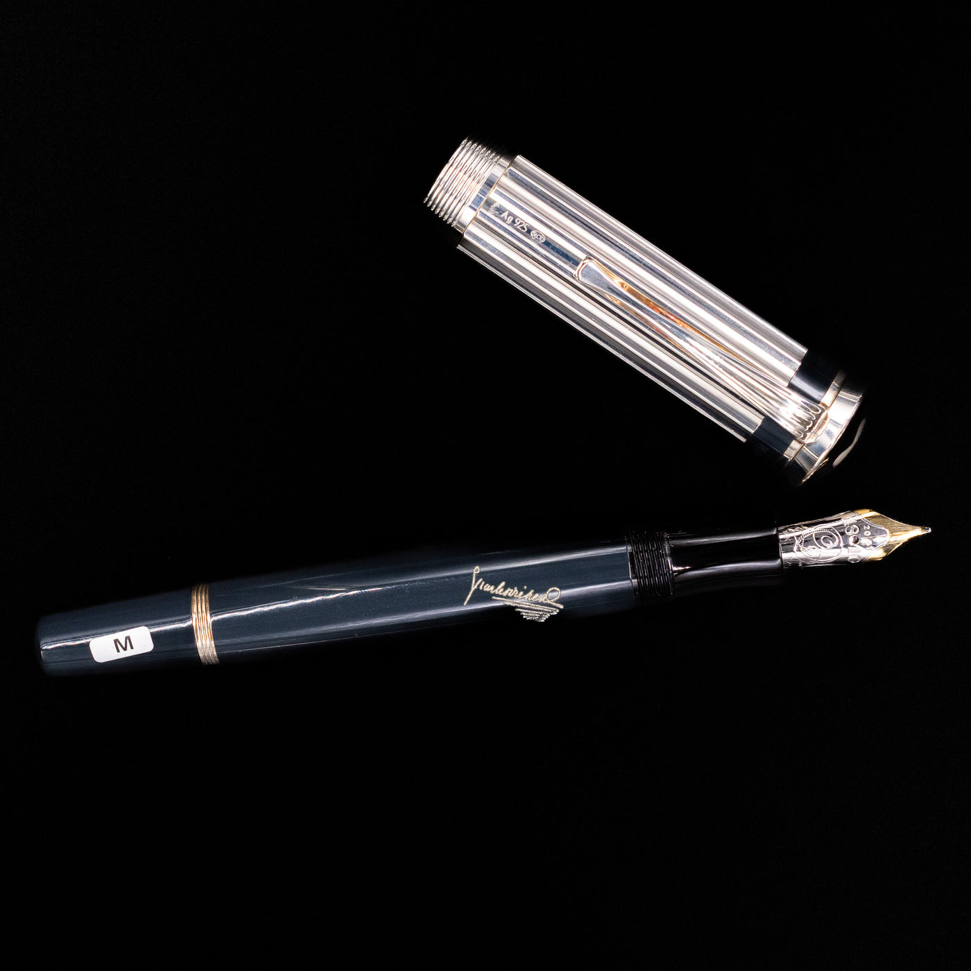 An overhead view of the Montblanc Writer's Edition Charles Dickens Fountain Pen - Preowned uncapped.