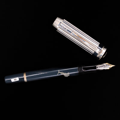 An overhead view of the Montblanc Writer's Edition Charles Dickens Fountain Pen - Preowned uncapped.