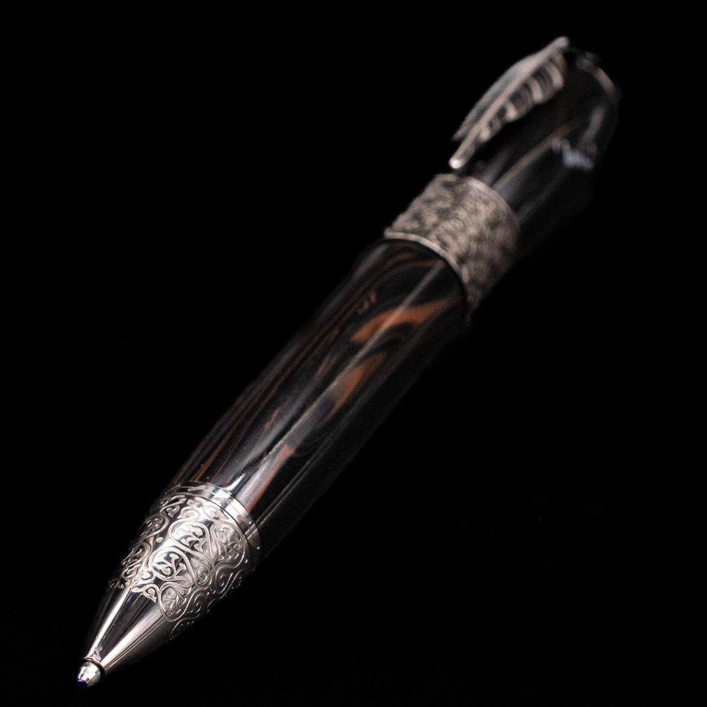Full view of the Montblanc Writer's Edition Daniel Defoe Ballpoint Pen - Preowned with a focus on the tip.