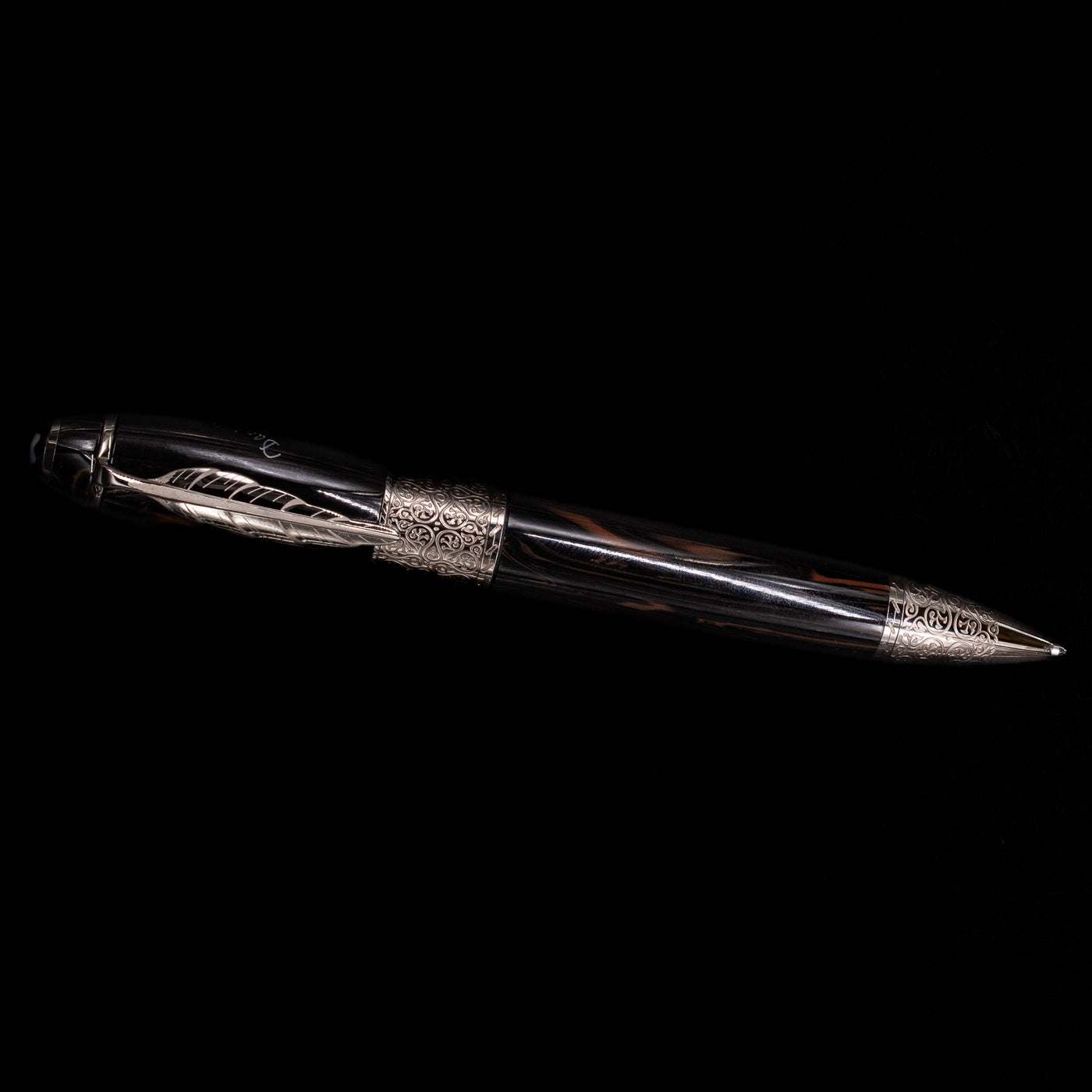 An overhead view of the Montblanc Writer's Edition Daniel Defoe Ballpoint Pen - Preowned activated.