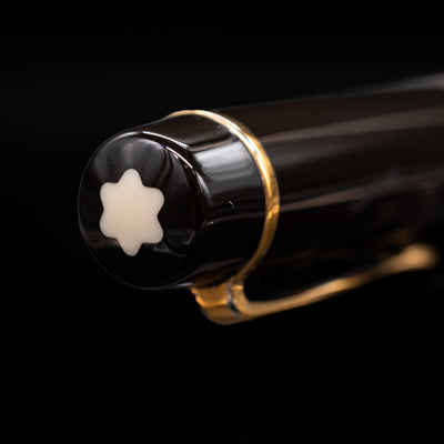 Zoomed-in view of the top of the cap with the finial on the Montblanc Writer's Edition Ernest Hemingway Ballpoint Pen - Preowned.