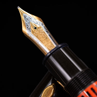  A macro shot of the nib with its intricate detailing and logo engraving for the Montblanc Writer's Edition Ernest Hemingway Fountain Pen - Preowned.