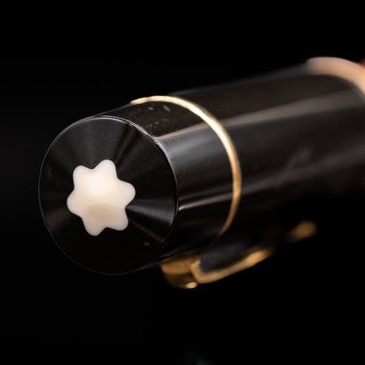 Zoomed-in view of the top of the cap with the finial on the Montblanc Writer's Edition Ernest Hemingway Fountain Pen - Preowned.