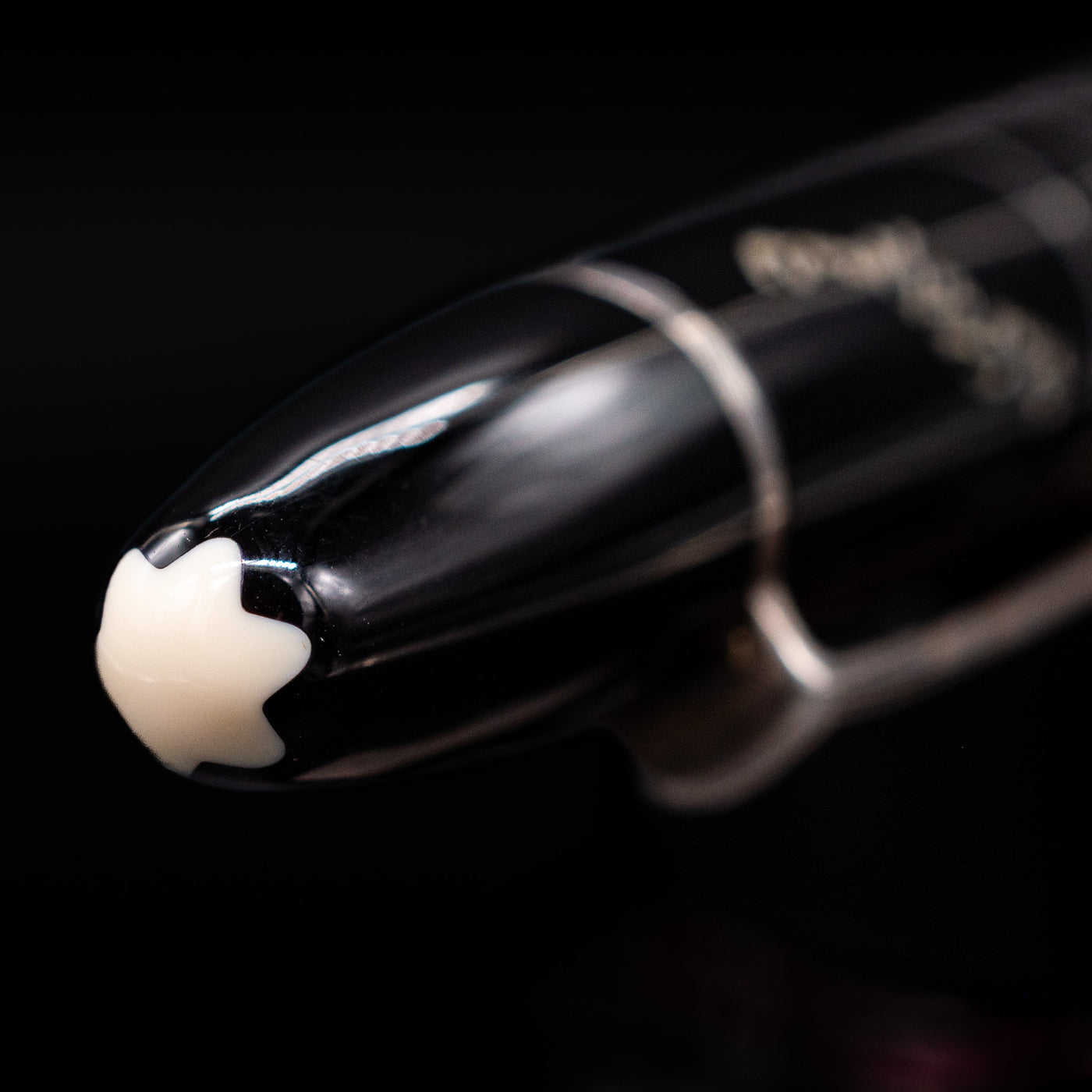 Zoomed-in view of the top of the cap with the finial on the Montblanc Writer's Edition F Scott Fitzgerald Ballpoint Pen - Preowned