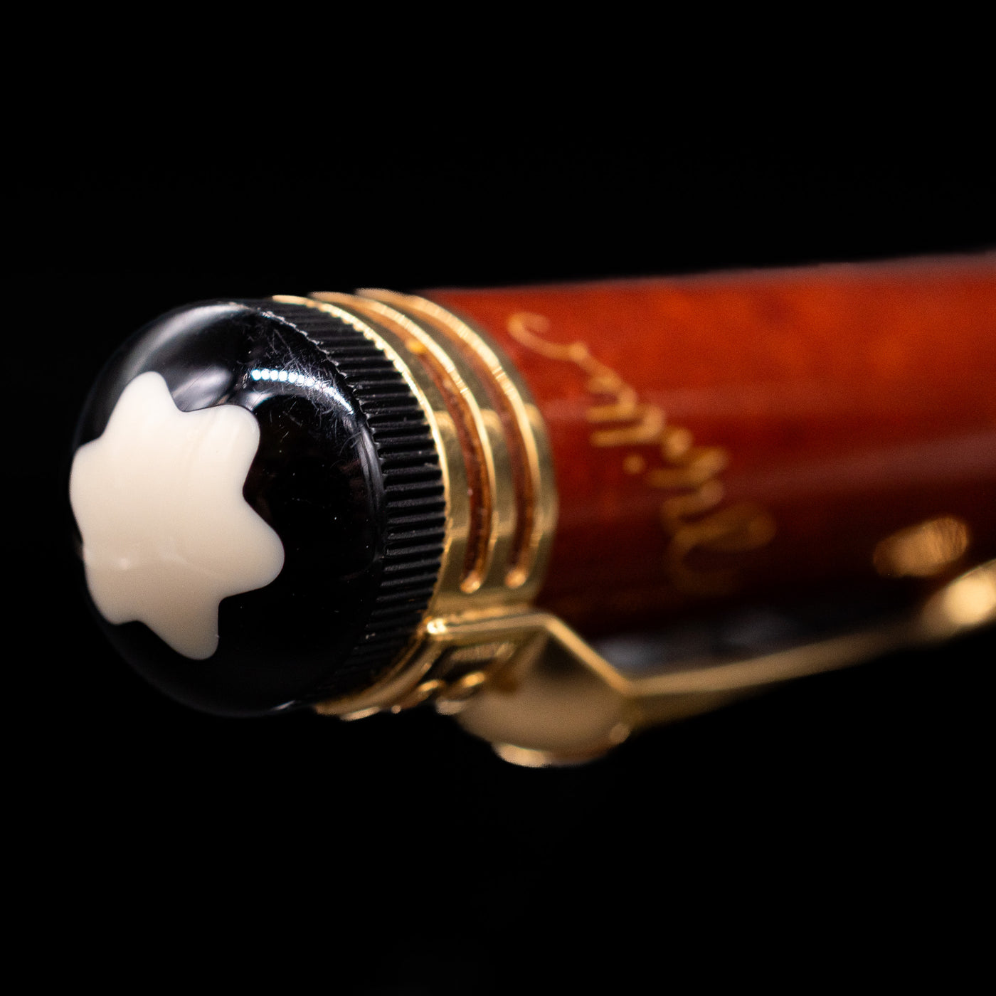 Zoomed-in view of the top of the cap with the finial on the Montblanc Writer's Edition Friedrich Schiller Ballpoint Pen - Preowned.