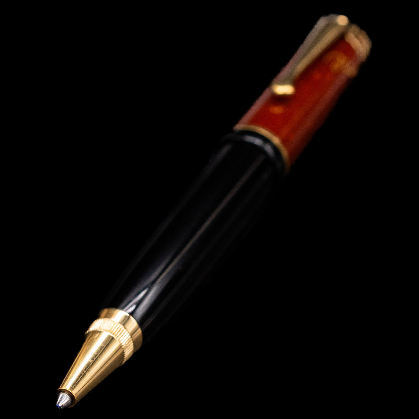 A full view of the Montblanc Writer's Edition Friedrich Schiller Ballpoint Pen - Preowned with a focus on the tip.