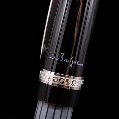 A detail shot of the writer's signature by the center band on the Montblanc Writer's Edition Honore de Balzac Ballpoint Pen - Preowned.