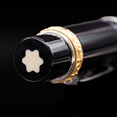 A zoomed-in view of the top of the cap with the finial on the Montblanc Writer's Edition Honore de Balzac Ballpoint Pen - Preowned.