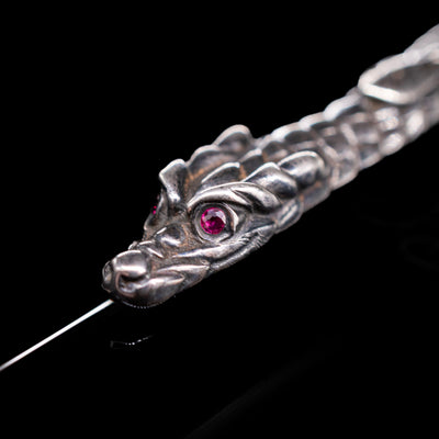 A macro shot of the dragon on the clip of the Montblanc Writer's Edition Imperial Dragon 1993 Fountain Pen - Preowned.