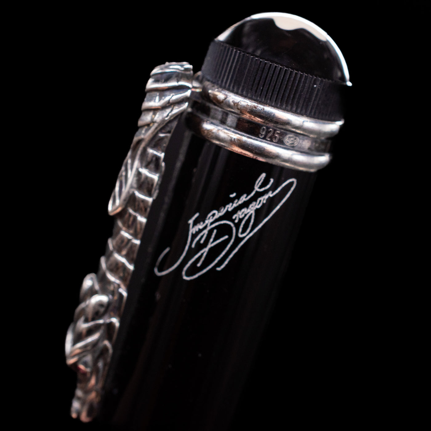 A macro shot showcasing the name of the pen, the Montblanc Writer's Edition Imperial Dragon 1993 Fountain Pen - Preowned.