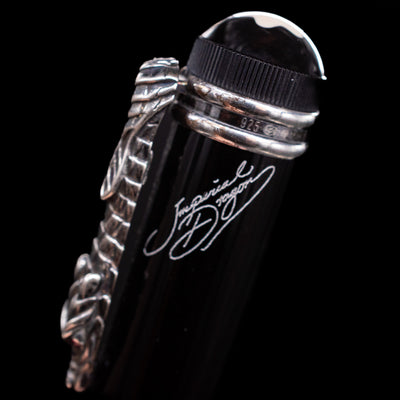 A macro shot showcasing the name of the pen, the Montblanc Writer's Edition Imperial Dragon 1993 Fountain Pen - Preowned.