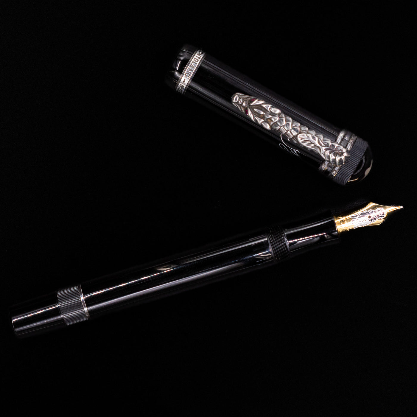  An overhead view of the Montblanc Writer's Edition Imperial Dragon 1993 Fountain Pen - Preowned uncapped.
