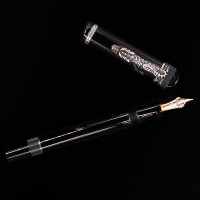  An overhead view of the Montblanc Writer's Edition Imperial Dragon 1993 Fountain Pen - Preowned uncapped.