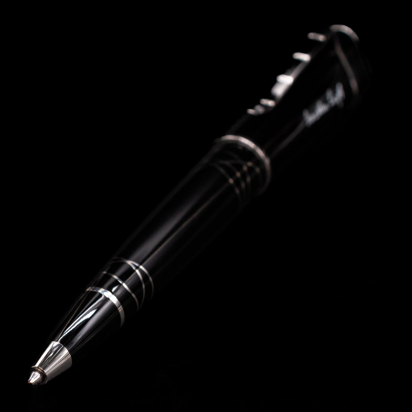 A full view of the Montblanc Writer's Edition Jonathan Swift Ballpoint Pen - Preowned with a focus on the tip.
