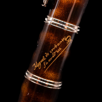 A zoomed-in shot of the signature of the writer on the body of the Montblanc Writer's Edition Miguel de Cervantes Ballpoint Pen - Preowned.