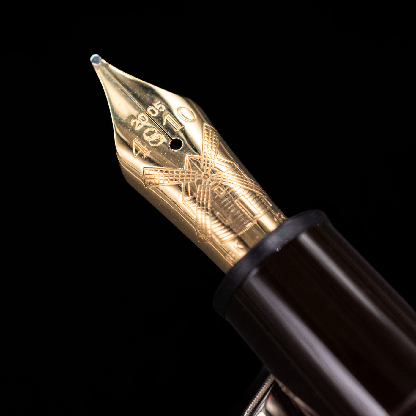  A macro shot of the nib with its intricate detailing and logo engraving for the Montblanc Writer's Edition Miguel de Cervantes Fountain Pen - Preowned.
