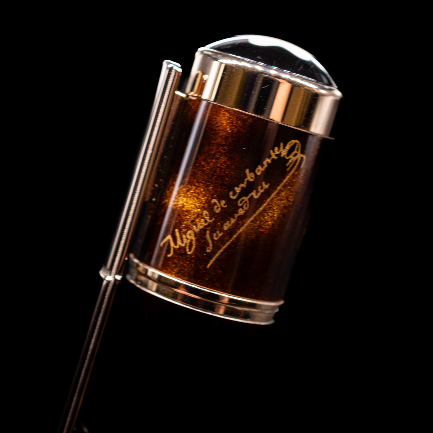 A macro shot of the writer's signature on top of the body of the Montblanc Writer's Edition Miguel de Cervantes Fountain Pen - Preowned.