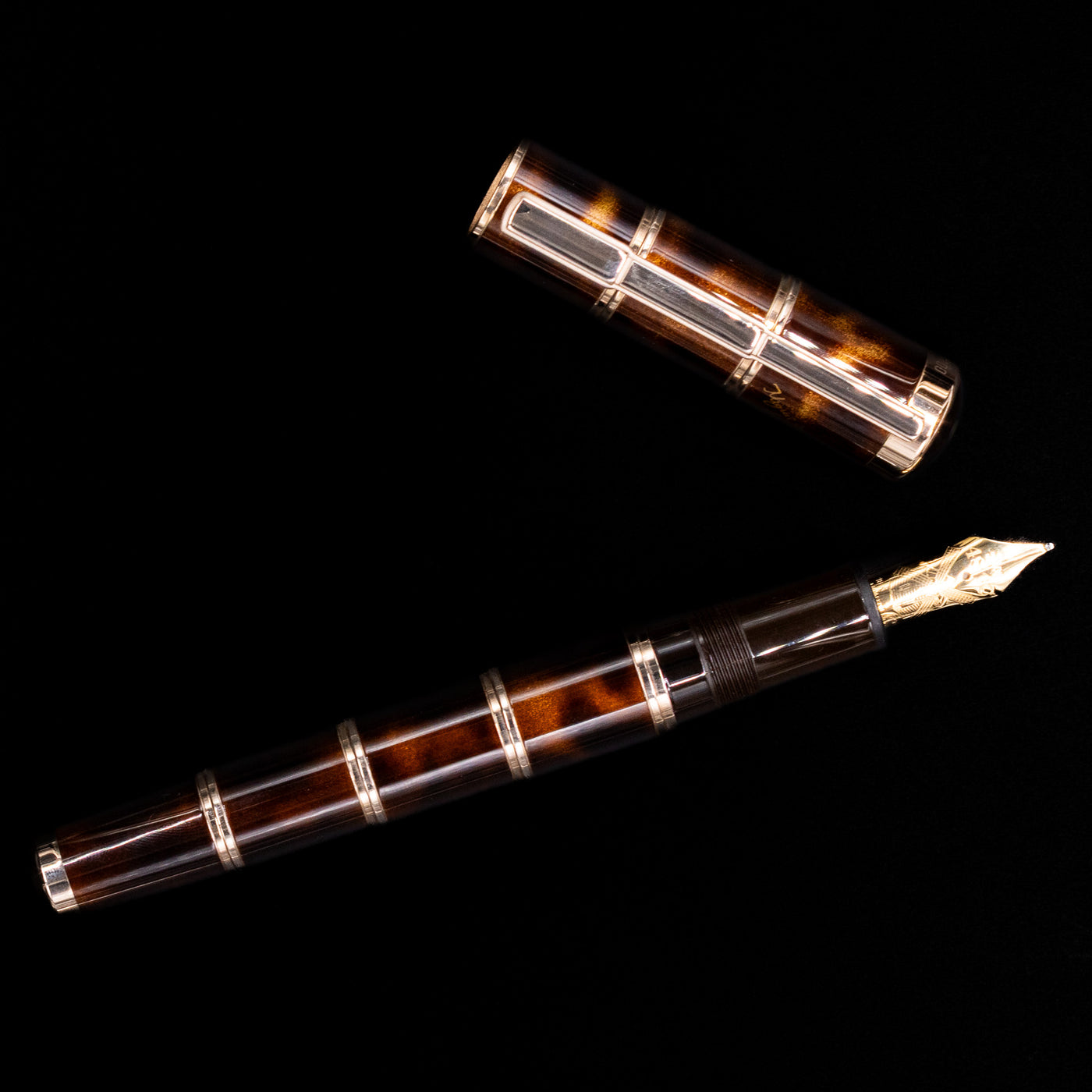 An overhead view of the Montblanc Writer's Edition Miguel de Cervantes Fountain Pen - Preowned uncapped.