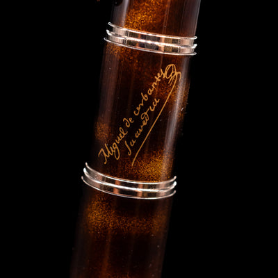 A zoomed-in view of the writer's signature on the body of the mechanical pencil on the Montblanc Writer's Edition Miguel de Cervantes Mechanical Pencil - Preowned