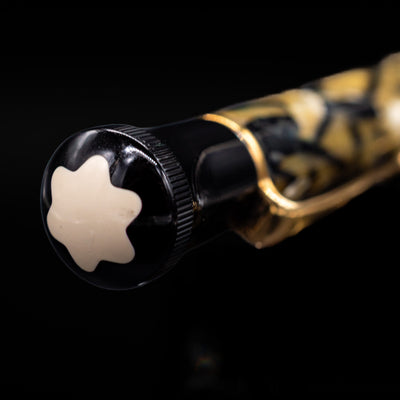 Zoomed-in view of the top of the cap with the finial on the Montblanc Writer's Edition Oscar Wilde Ballpoint Pen - Preowned.