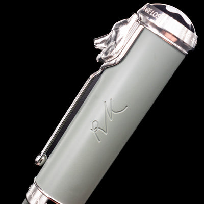 A zoomed-in shot of the writer's signature on the side of the cap of the 
Montblanc Writer's Edition Rudyard Kipling Ballpoint Pen - Preowned.