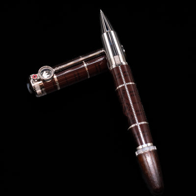 Montblanc Writer's Edition Sir Arthur Conan Doyle Limited Edition 1902 Rollerball Pen - Preowned laying on top of its cap in a crossed position showing full view of the entire uncapped pen.