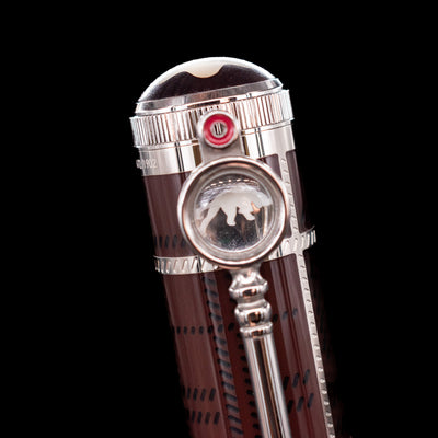 A detail shot of the top of the cap with the clip loop overseeing the mountain on the Montblanc Writer's Edition Sir Arthur Conan Doyle Limited Edition 1902 Rollerball Pen - Preowned.
