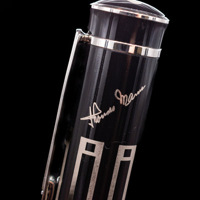 A detailed shot of the writer's signature on top of the body of the Montblanc Writer's Edition Thomas Man Ballpoint Pen - Preowned.