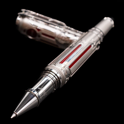 Montblanc Writer's Edition Victor Hugo Limited Edition 1831 Rollerball Pen - Preowned laying across its own cap, crossed, with a focus on the tip.