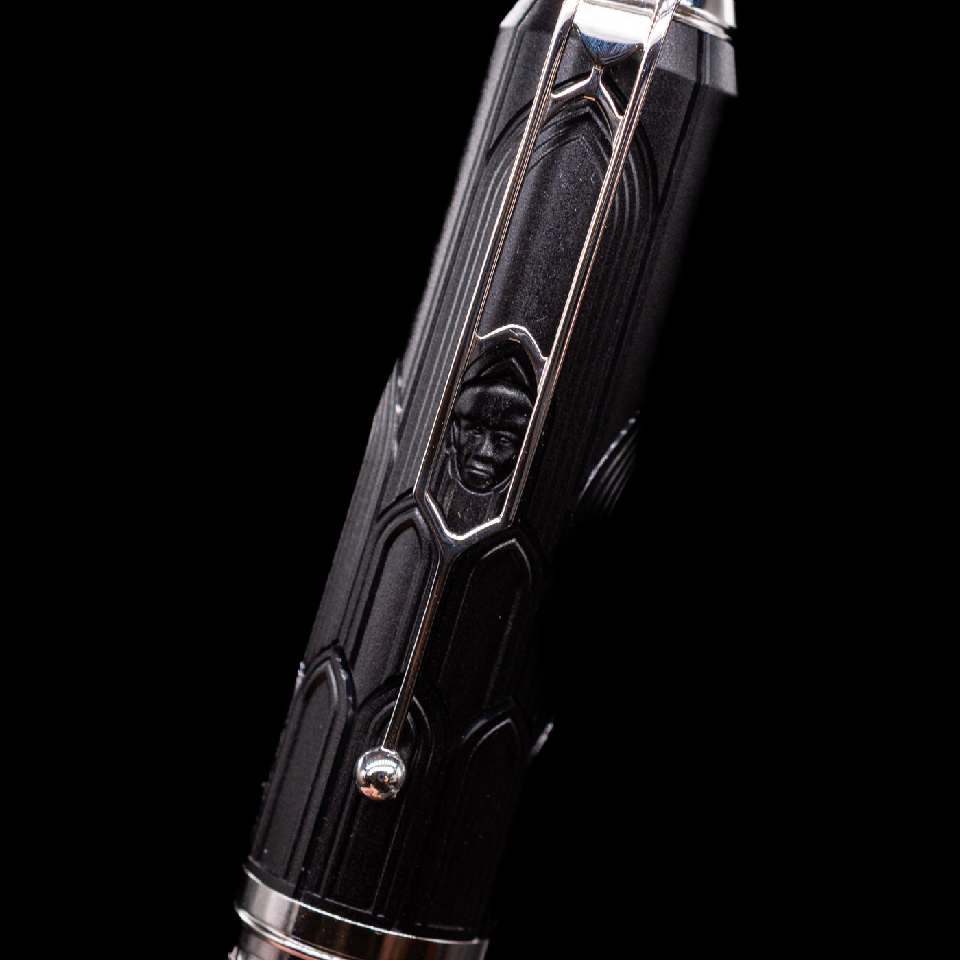 A close-up detailed shot of the dace behind the tower according to the story on the Montblanc Writer's Edition Victor Hugo Limited Edition Ballpoint Pen.