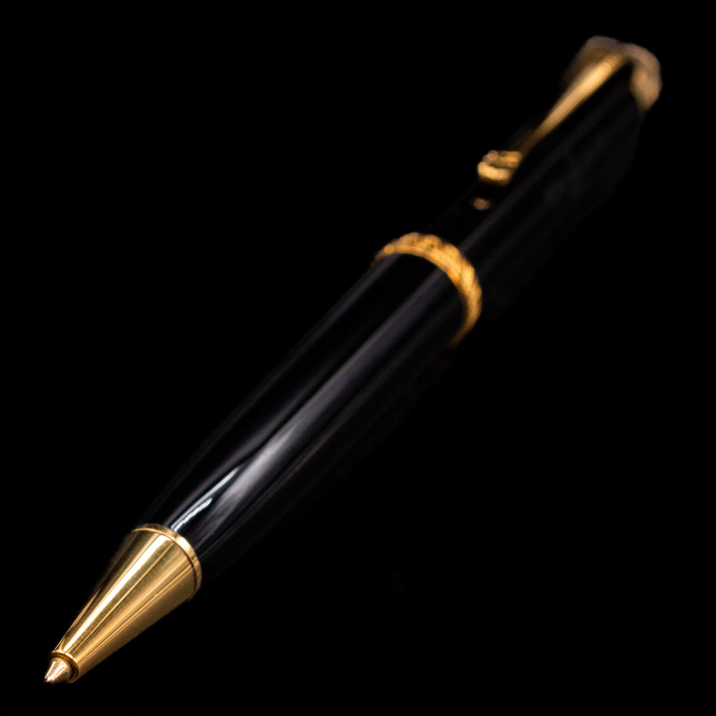 A full view of the Montblanc Writer's Edition Voltaire Ballpoint Pen - Preowned with a focus on the activated tip.