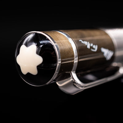 Zoomed-in view of the top of the cap with the finial on the Montblanc Writer's Edition William Faulkner Fountain Pen - Preowned.