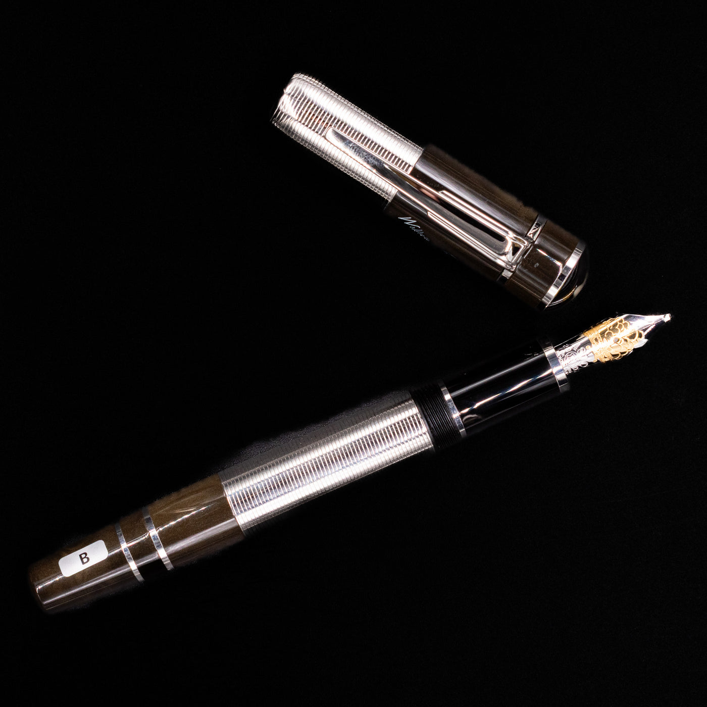 An overhead view of the Montblanc Writer's Edition William Faulkner Fountain Pen - Preowned uncapped.